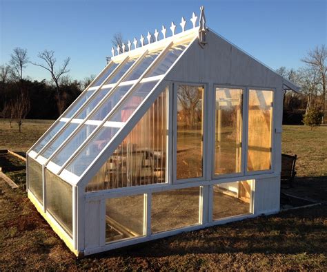 green house out if metal windows|reclaimed greenhouse framing.